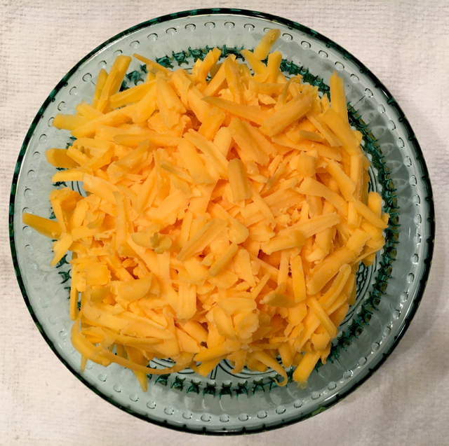 Grated cheddar cheese