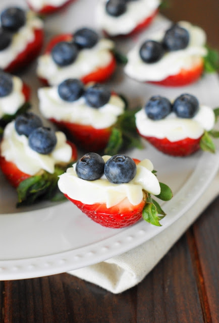 Red, white, and blue strawberry cheesecake bites