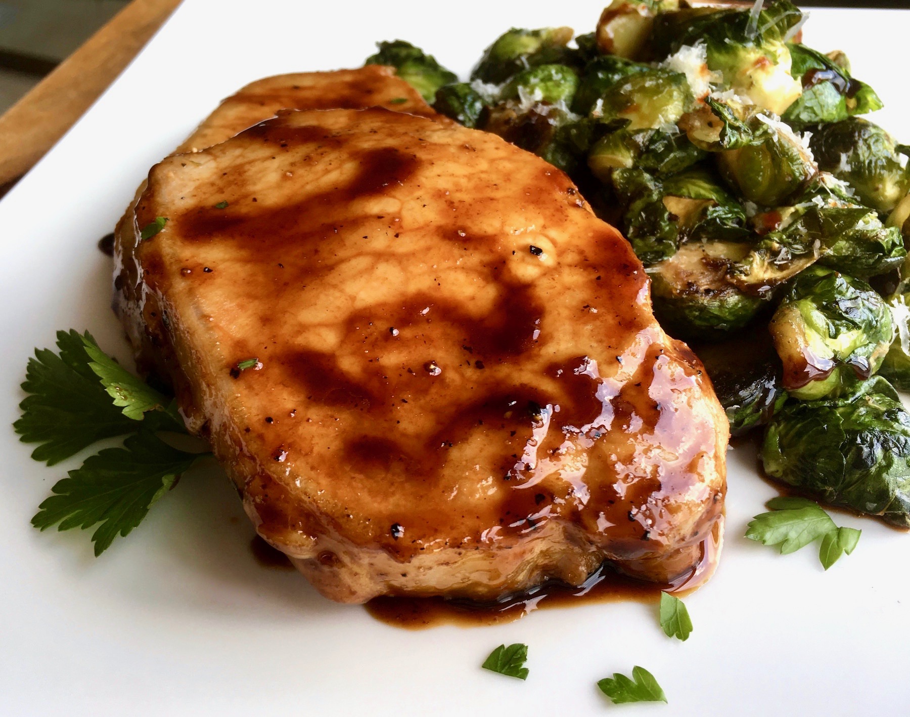 Have this easy skillet Pork Chops with Maple Balsamic Reduction on the table in under 30 minutes. Perfect for a weeknight meal, this simple skillet dinner of Pork Chops with Maple Balsamic Reduction will quickly become a family favorite. 