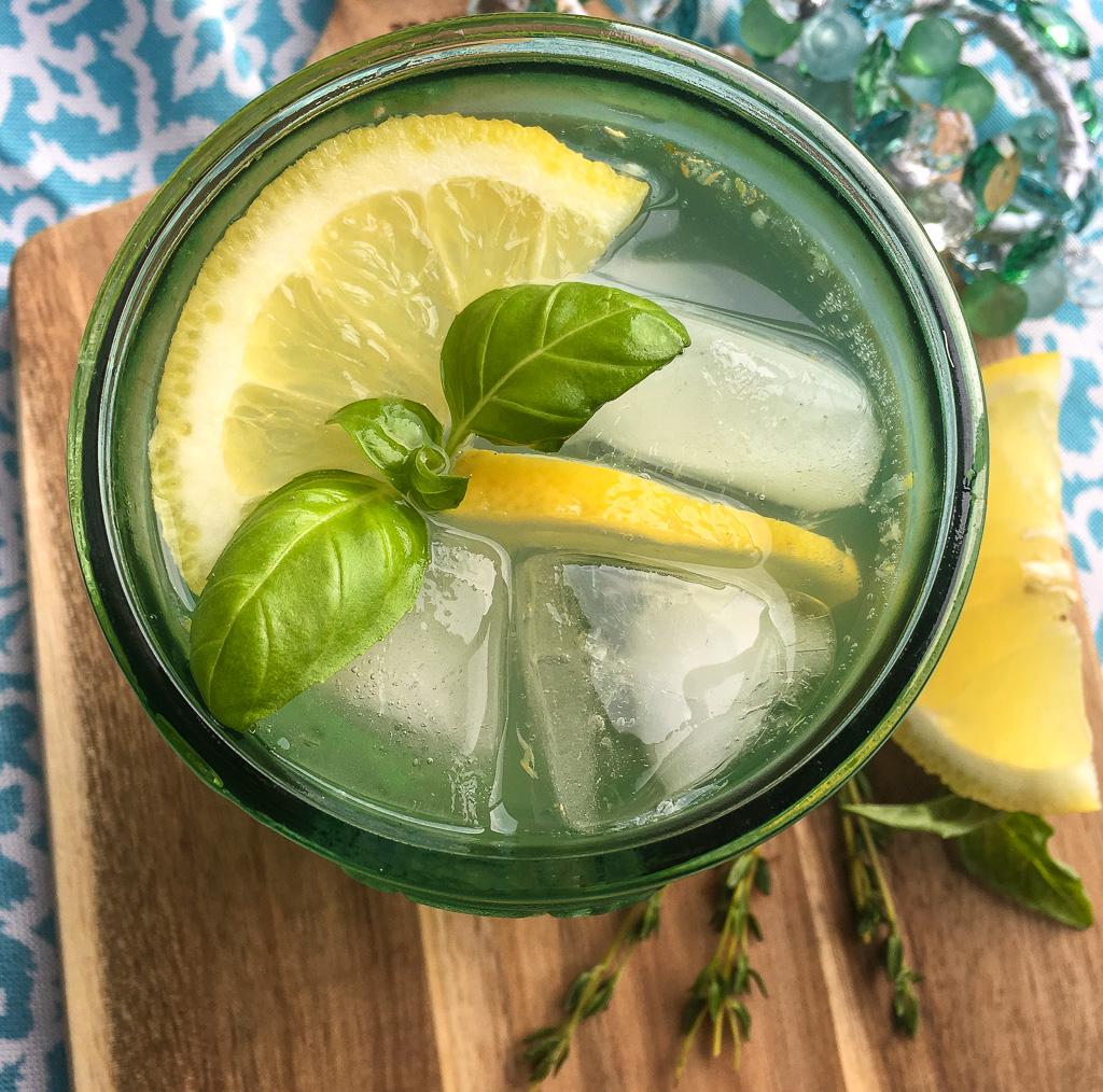 This refreshing spritzer is full of fantastic flavors, including lemon, fresh herbs, and ginger. It’s bright fruity flavor pairs perfectly with the warm earthiness of the culinary herbs and freshly grated ginger for a truly interesting combination. One taste and this is sure to become a new warm weather favorite!   